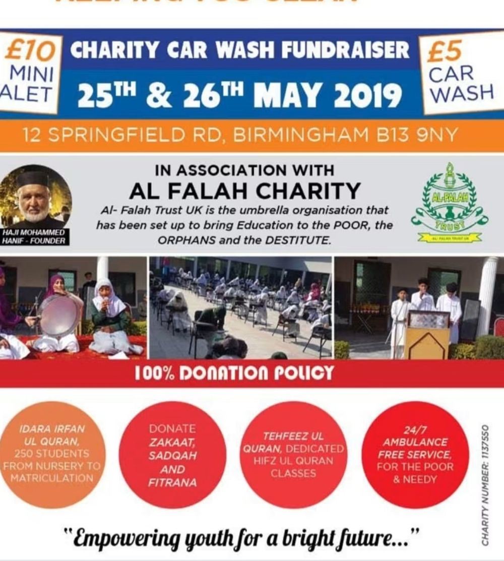 Volunteer in costume collecting donations at a charity car wash event